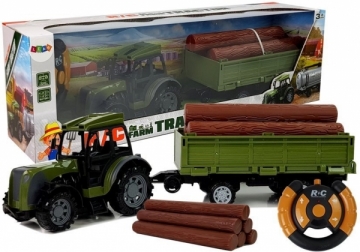Nuotoliniu būdu valdomas traktorius su priekaba ir rąstais Radiovadāmās rotaļlietas
