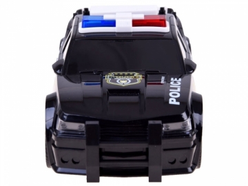 Policijos automobilis su šviesomis ir sirena, juoda