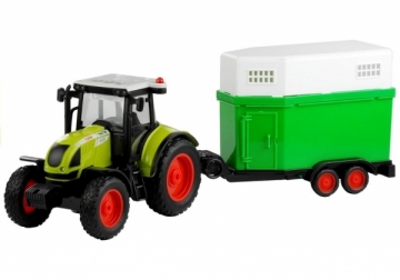 Traktorius su gyvulių gabenimo priekaba